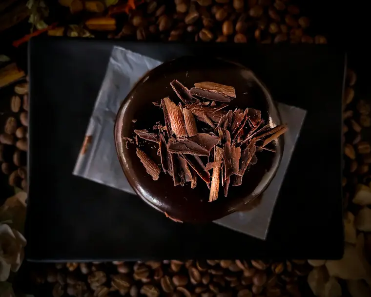 A barista steaming milk at the Roastline bar